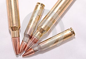 Four rifle bullets, two .223 caliber and two .300 Winchester Magnum caliber