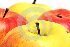 Four ripe apples close up shot