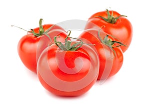 Four ripe red tomato