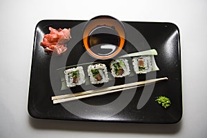 Four rolls on black plate 3
