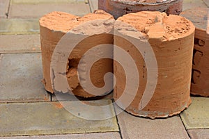 Four round pieces of a brick wall. Accurate diamond drilling work