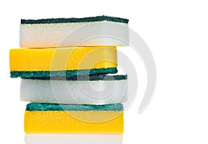 Four scouring pads on a white background photo