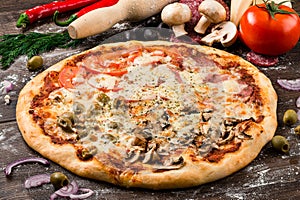 Four Season Pizza slice on the wooden table