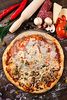 Four Season Pizza slice on the wooden table