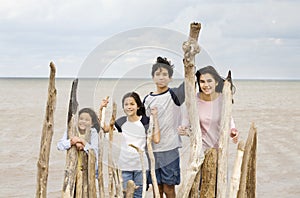 Four siblings by the lakeshore