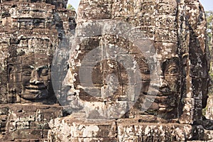 Four sides stone faces of Bayon temple in Angkor