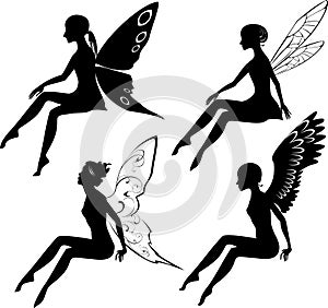 Four silhouettes of fairies photo