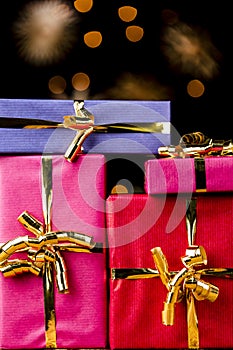 Four Single-Colored Gifts with Golden Bows