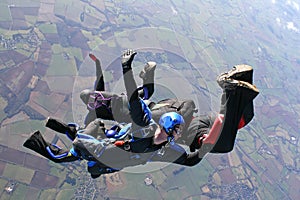 Four skydivers in freefall