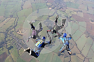 Four skydivers in freefall