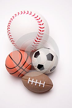 Four sports balls