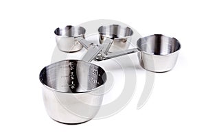 Four stainless steel measuring cups clipped together