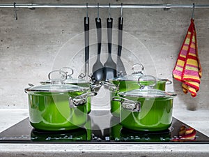 Four stewpots on induction cooker