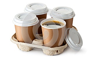 Four take-out coffee in holder photo