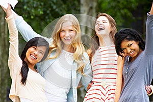 Four Teenage Girls Celebrating Successful Exam Results