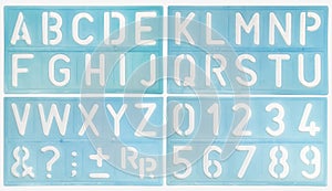 four template alphabet ruler, with whiteb background. engineering and studying concept