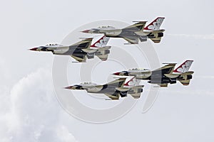 Four Thunderbirds flying in formation