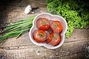 Four Tomatoes in an eco-friendly portable disposable container