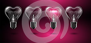 Four transparent heart-shaped bulbs, in one of which the word Love glows in place of a tungsten filament on a pink background.