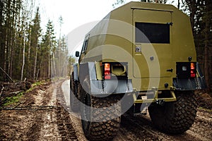 Large all-wheel drive all-terrain vehicle in the forest