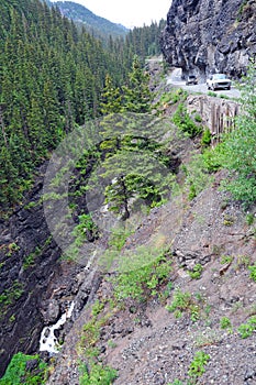 Four wheel drive vehices on dangerous exposed Shelf Road in the Rocky Mountains, Colorado