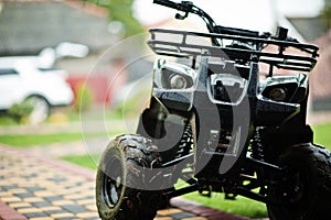 Four-wheller ATV quad bike in home use