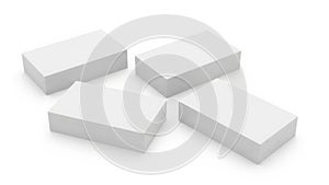 Four white rectangular blocks arranged in a diagonal formation on a plain background