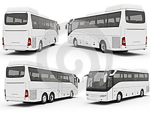 Four white tour buses in various angles
