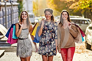 Four Women with Shopping Bags