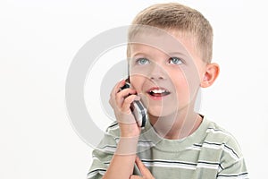 Four Year Old Boy Speaking On Cellphone