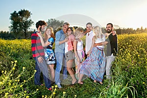 Four young couples enjoying a day in the country.