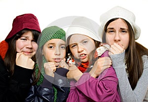 Four young girls in winter outfit