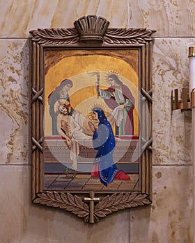 The fourteenth of the Fourteen Stations of the Cross inside Christ the King Church in Dallas, Texas.