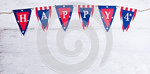 Fourth of July holiday banner on white wooden boards