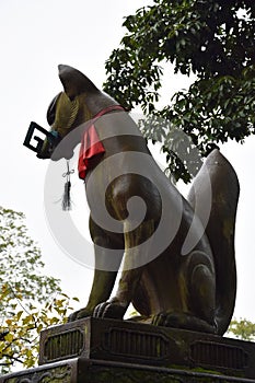 Fox Guardian in front of the Fushimi Inari Shrine in Kyoto