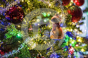 Fox made of glass hanging as decorations on a Christmas tree