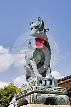 Fox statue at Fushimi Inari Shrine, Kyoto District, Japan