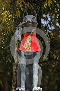 Fox statue at the Fushimi inari taisha shrine