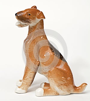 Fox terrier Dog ceramic figurine, isolated on white