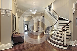 Foyer with curved staircase