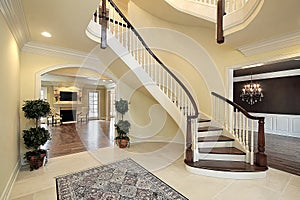 Foyer with curved staircase