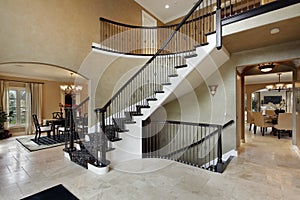 Foyer with curved staircase