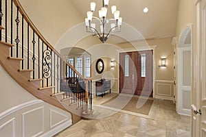 Foyer with curved staircase