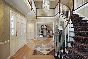 Foyer with floor design photo