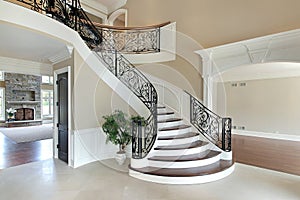 Foyer with grand staircase photo