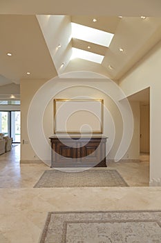 Foyer of home with skylight photo