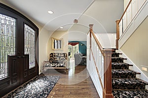 Foyer with leaded glass door