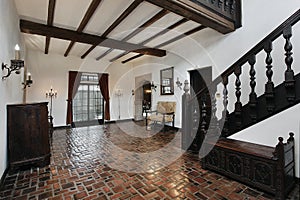 Foyer with wood beams photo