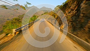 FPV Flight Over Mountain Road On The Ha Giang Loop At Sunset, North Vietnam