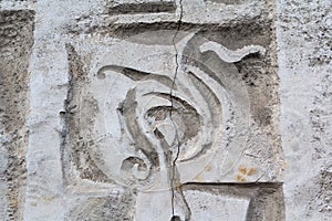 Fractured relief on a concrete wall